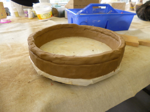 Starting the coils on the particleboard base