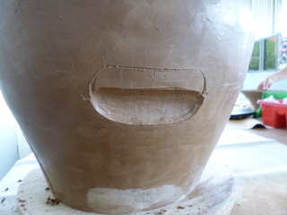 Side marked and clay removed to fit the handles